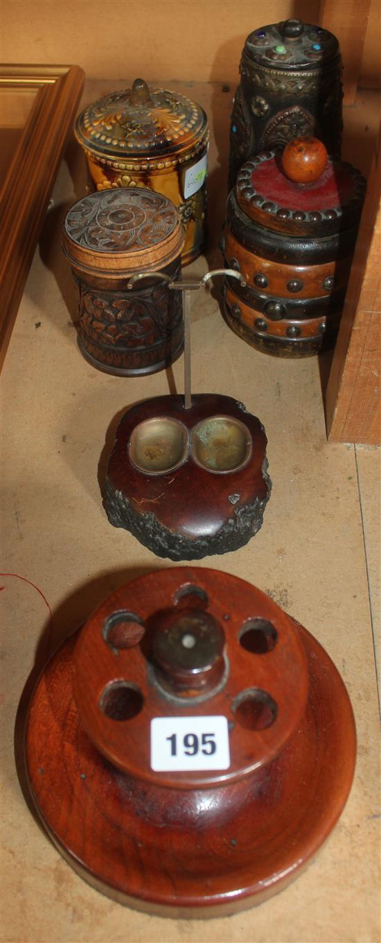 4 tobacco jars and 2 pipe stands